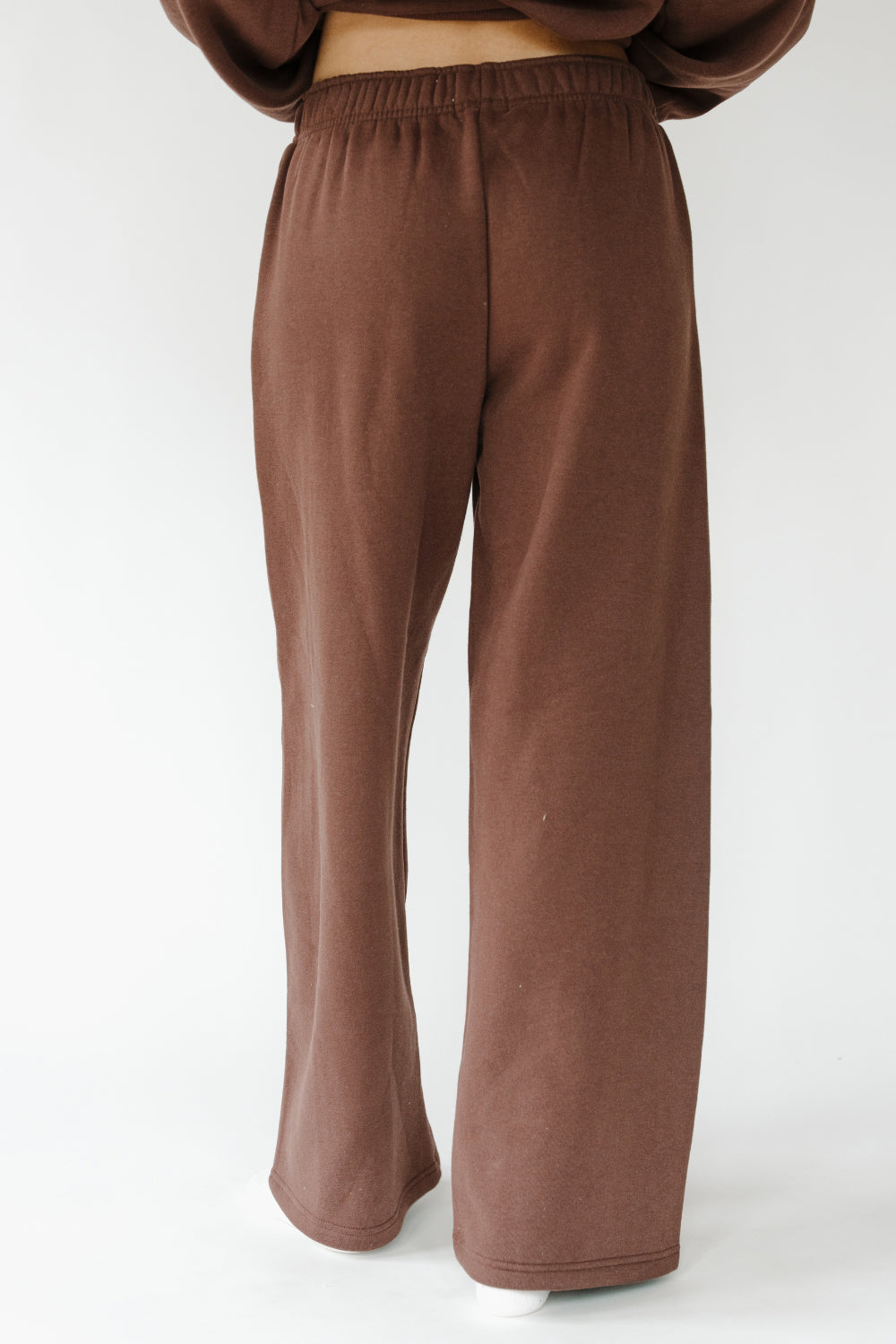 Back of the espresso Puff Series Sweatpants, wide leg fit. The Happy Camp3r