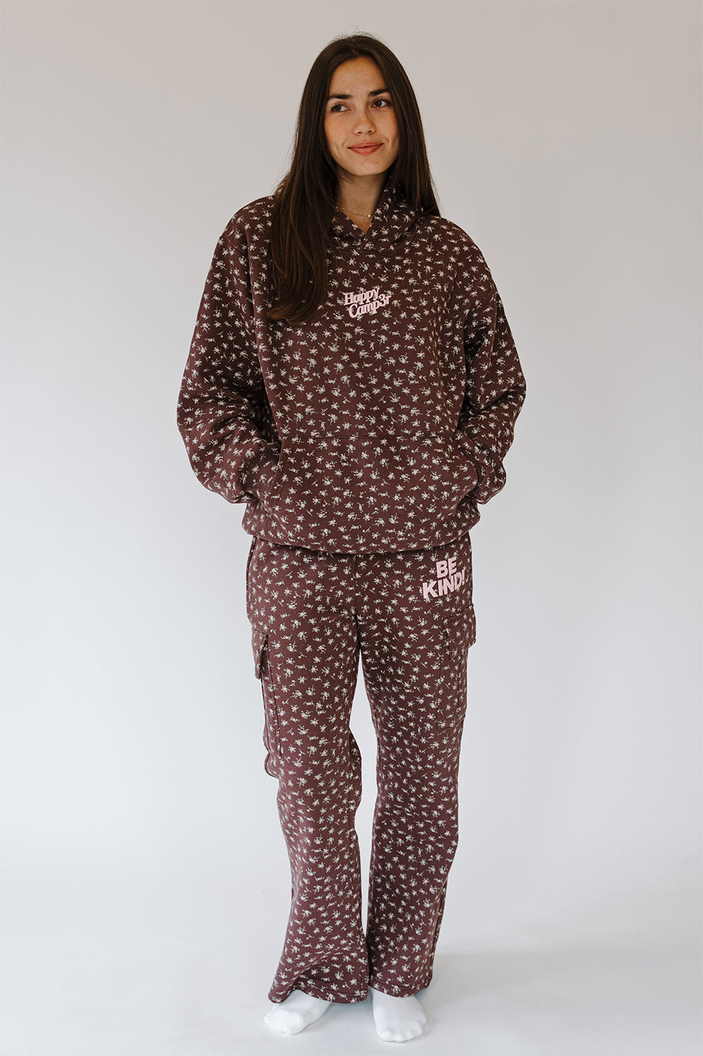 Model in the Be The Kind Cargo Sweatpants and matching hoodie, full length. The Happy Camp3r