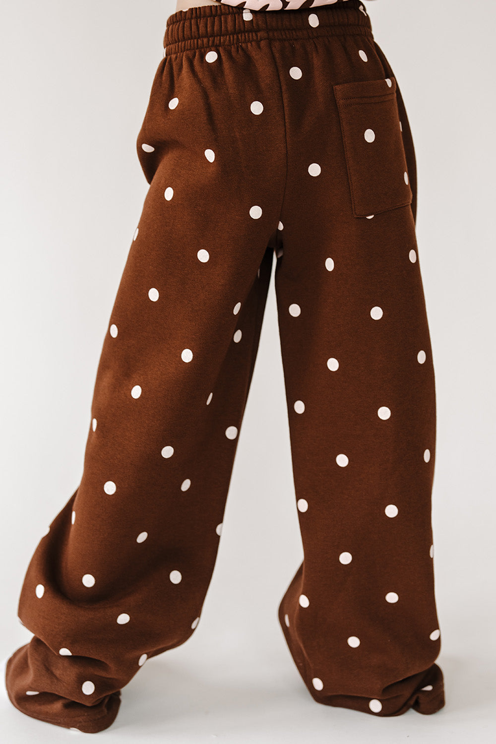 Back of the brown polka dot Cocoa Dot Youth Sweatpants. The Happy Camp3r