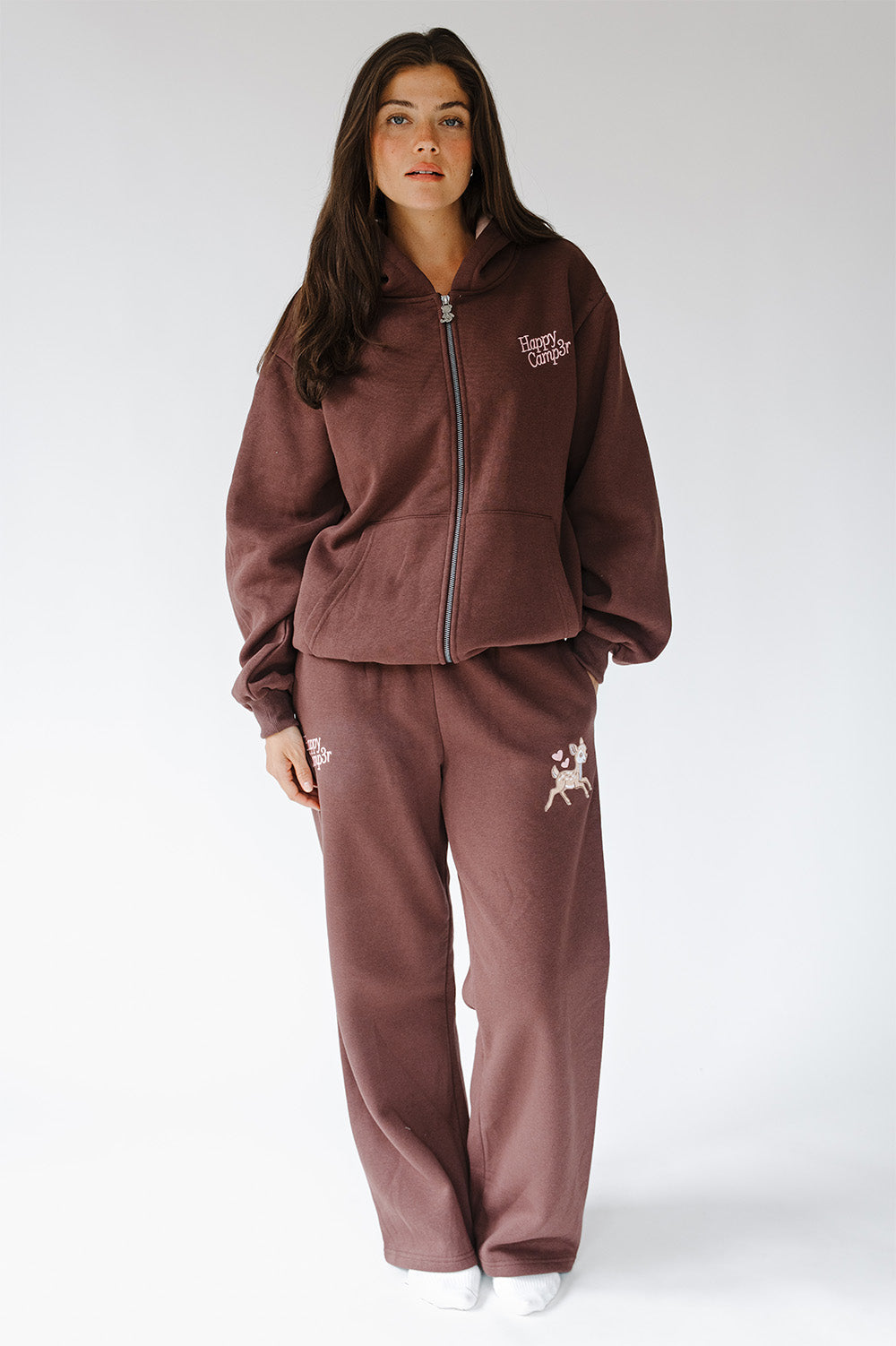 Model in the Fawn Love Sweatpants and matching zip up hoodie, full length. The Happy Camp3r