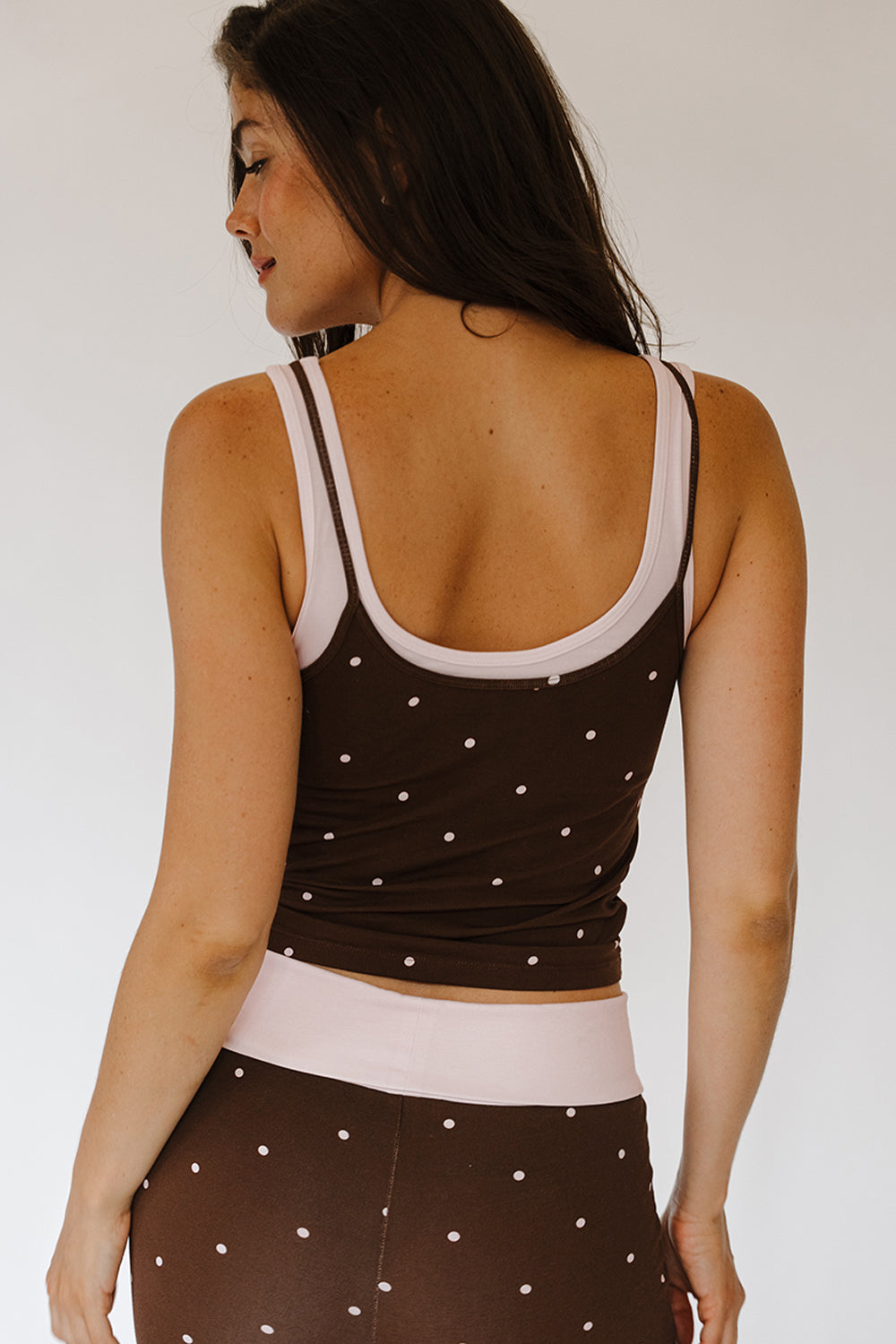 Back of the brown Cocoa Dot Nikki Top with pink trim. The Happy Camp3r
